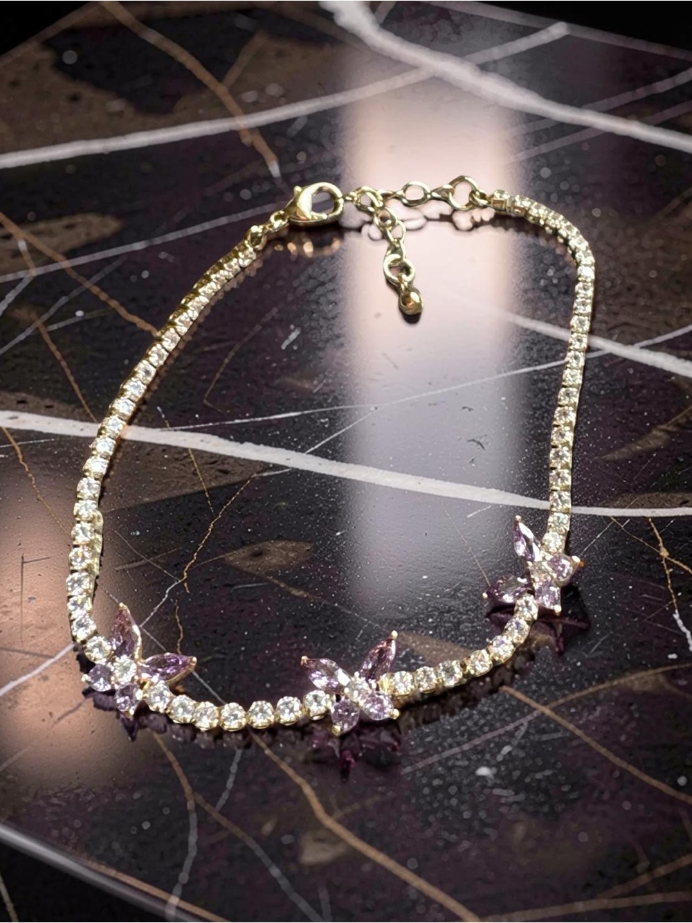 Elegant Gold-Tone Tennis Bracelet with purple Crystal Floral Accents